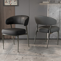 Chaise de salle à manger en cuir de luxe léger, coussin à ressorts épaissi, dossier haut de gamme, style italien, pour hôtel et restaurant moderne et simple