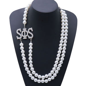 Trendy Zwart Wit Studentenvereniging <span class=keywords><strong>Swing</strong></span> Phi <span class=keywords><strong>Swing</strong></span> Accent Ontwerp Griekse Sps 1969 Soror Sieraden 2 Rijen Parel Ketting Decoratie Ketting - Product Image 1