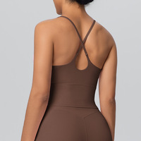 Soutien-gorge de sport moulant en nylon double face couleur unie à bretelles croisées pour la course, le fitness et le yoga pour femme