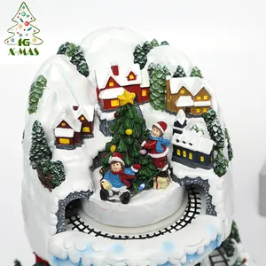 KG Xmas Custom Wholesale European Style Adornos De Navidad Rotating Train Musical Light Resin House Christmas Decorations