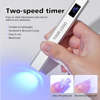 Lampe à ongles LED UV portable en plastique pour usage domestique, fonctionnant sur piles, écran argenté, lumière rouge, minuterie à deux vitesses, focalisation puissante