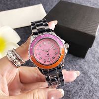 Montre à quartz de luxe pour femme, cadran rose, lunette dégradée, boîtier en alliage, logo personnalisé, vente directe usine