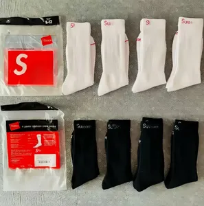Vente en gros ODM Chaussettes jetables antidérapantes pour hommes 4 paires blanches 100% coton et acétate - Product Image 1