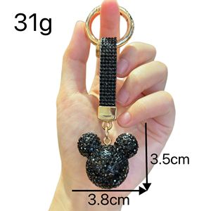 <span class=keywords><strong>Llavero</strong></span> de <span class=keywords><strong>Mickey</strong></span> al por mayor con diamantes completos, bonito y de arcilla con material de diamante, adecuado para pequeños accesorios o colgantes de bolso. - Product Image 6
