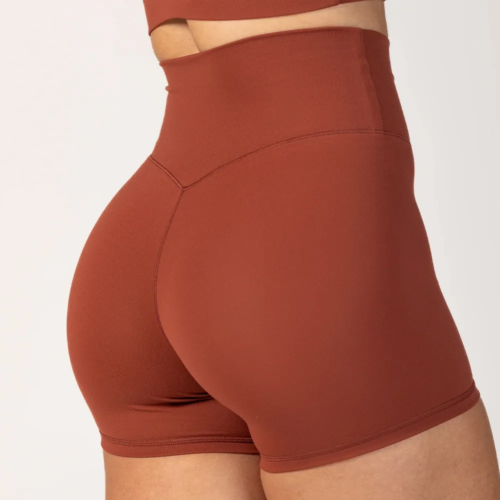 Venta al por mayor de pantalones cortos de yoga Correr Deportes Leggings cortos Elástico de cintura alta Levantamiento de glúteos Entrenamiento Pantalones cortos de yoga con bolsillos ocultos