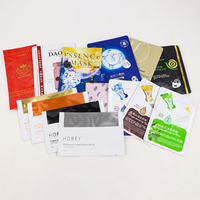 Sacs d'emballage personnalisés pour masques faciaux cosmétiques, qualité alimentaire, prix d'usine, thermoscellables, à trois soudures latérales, vente en gros