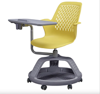 Chaise d'étude moderne à prix réduit avec accoudoirs en plastique confortables et tablette pliable pour l'école et l'appartement