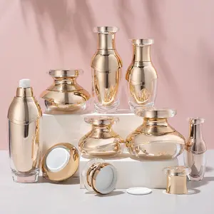 Facial Skincare Bottle Cream Jar Cosmetic Packaging Set Acrylic Plastic Custom Luxury 30g 50g 30ml 50ml 100ml Empty Gold Pink