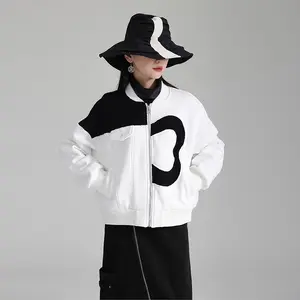 2023 hiver nouvelle veste asymétrique à manches longues avec col montant noir blanc contraste peluche épaissi manteau rempli