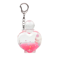 Porte-clés créatif en acrylique en forme de flacon de parfum, rempli d'huile, avec flotteur 3D, paillettes et sable mouvant aquatique, cadeau promotionnel