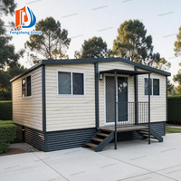 Maison conteneur pliable extensible au design tendance, isolée et résistante au vent, préfabriquée et mobile, avec terrasse et toit-terrasse pour complexe hôtelier