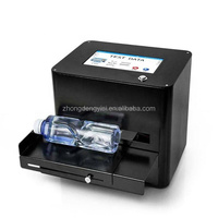 Imprimante jet d'encre de bureau pour le marquage de la date de production, adaptée aux sachets, cartons, boîtes métalliques et bouteilles en plastique