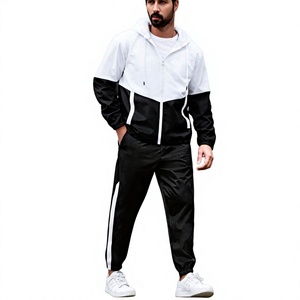 Survêtement à capuche zippé intégral colorblock noir et blanc pour homme avec pantalon assorti – Vêtements en gros OEM ODM - Product Image 1