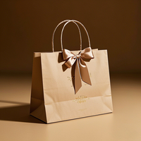 Sac en papier kraft personnalisé avec poignée en papier torsadé et nœud en satin pour boulangerie, cadeaux, vente au détail, commande en gros