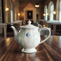 Service de table en céramique peint à la main, motif hirondelle en relief sous glaçure, design moderne et simple, comprenant bol, assiette, bouilloire, tasse à café haut de gamme