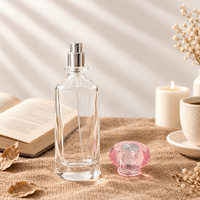 Flacon de parfum en verre transparent à fond épais de 50 ml et 100 ml, flacon vide en forme de cylindre, flacon vaporisateur de parfum avec pulvérisateur argenté ou doré