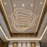 Luminaire suspendu de luxe suspendu de grand plafond arrondi doré d'hôtel lustre décoratif moderne en cristal pour escalier à led