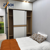 ZYBOX A1 Maison conteneur ignifuge extensible de 20 pieds, préfabriquée avec véranda et terrasse, usine source, livraison en 10 jours, prête à être expédiée, cabane ADU