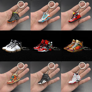 Lote de llaveros personalizados de plástico PVC y goma con diseños de tenis, baloncesto y zapatillas 3D, ideales para venta al por mayor. - Product Image 3