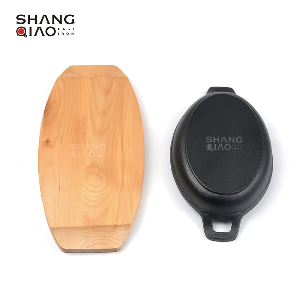 ミニ楕円形木製ベースシズリングプレート鋳鉄パングラタン皿メーカー卸売