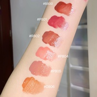 Daimanpu Gelée de thé rose longue durée Glaçure à lèvres liquide Finition miroir brillante Maquillage des lèvres à base de produits chimiques avec logo personnalisé