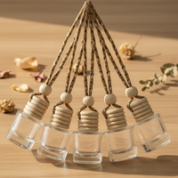 Diffuseur de parfum suspendu professionnel sécurisé en verre transparent avec diverses options d'impression personnalisée pour l'utilisation en voiture