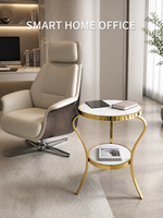 Table d'appoint élégante à deux niveaux en verre décoratif avec cadre en fer courbé doré pour salon, hôtel, OEM