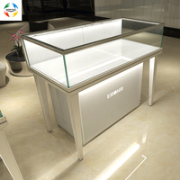 Présentoir de lunettes de soleil et de montres personnalisé au design moderne pour magasin de détail Prix d'usine Fabriqué en verre trempé et aluminium