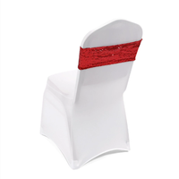 Housses de fauteuil en polyester élastique avec décorations en ruban et dos en sequins pour les célébrations d'hôtels et de mariages
