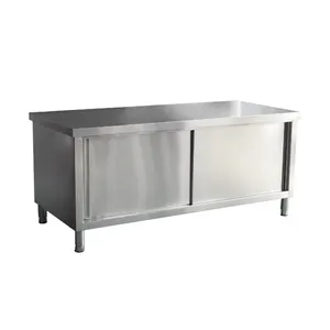 Mesa de trabajo de cocina comercial de acero inoxidable con armario de almacenamiento de puerta corredera