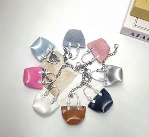 Mini Handbag Keychains Set Assorted Colors PU Leather Small Purse <b>Key</b> <b>Rings</b> Bag Charms Fashion Accessories for Women Gifts - Product Image 1