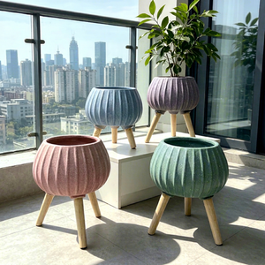 Modern Resin Flower Pots with Wood Legs Glazed Minimalist Indoor Planters for Green Plants Set of 4 - Product Image 1