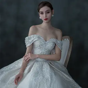 Off shoulder sleeveless V-neck Sparkling Beading Crystal Super Gorgeous Ball Gown Manufacturer made Wedding Dresses