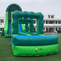 Grand toboggan aquatique gonflable commercial double avec palmiers pour enfants et adultes