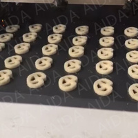 Ligne de production de machine de coupe-fil de biscuits de glacière de puce de chocolat petit équipement industriel de fabrication de biscuits d'écrou de coupe-fil
