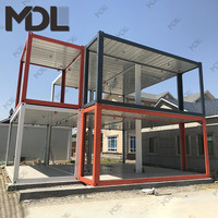 La maison en acier stable forte et sûre de métal encadre beaucoup de gens pour travailler la maison mobile de bureau de conteneur