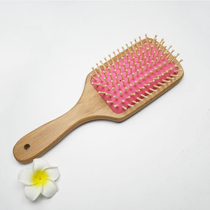 Vente en gros de peigne de massage du cuir chevelu à grande plaque aiguille en plastique à usage domestique coussin à <span class=keywords><strong>gaz</strong></span> en bois type de peigne commun - Product Image 1