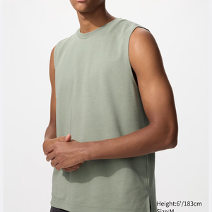 Camiseta sin mangas de algodón tejido para hombre Racerback, con aberturas anchas en los brazos para mayor movilidad, cómoda, transpirable y ecológica para gimnasio, correr y entrenar. - Product Image 4
