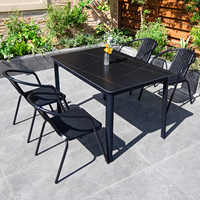 Mobilier d'extérieur moderne Ensemble de salle à manger 6 places Plateau en marbre Table à manger et fauteuil de patio imperméables et résistants à la chaleur