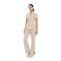 Ensemble de tenue médicale tissée à coutures thermocollées, comprenant un haut à col à revers et un pantalon coupe bootcut fendu, uniforme de santé sur mesure, vêtements de travail OEM pour esthétique et spa