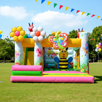 Château gonflable commercial abeille et papillon avec toboggan pour fêtes d'enfants et parcs d'attractions