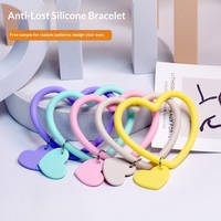 Vente en gros de porte-clés en silicone en forme de cœur, bracelet de poignet, sangle de téléphone anti-chute, anti-perte, unisexe, logo personnalisé
