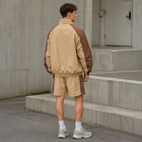 Ensemble de survêtement IKDEER personnalisé à blocs de couleurs, haut à demi-zip et short à cordon de serrage pour les loisirs en plein air et les activités quotidiennes