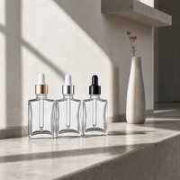 Flacon compte-gouttes carré en verre vide, flacon transparent pour sérum, bouchon doré, argenté ou noir, emballage cosmétique en gros