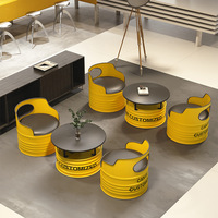 Ensemble table et chaises en fer forgé 4S de style industriel moderne pour restaurant commercial, design créatif en forme de fût d'huile, pour café en extérieur