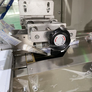 Servo Motor Pillow Type Chocolate Ball Bar <strong>Flow</strong> Wrap Packaging Cereal Bar Horizontal <strong>Packing</strong> <strong>Machine</strong> With Punch <strong>Function</strong> - Product Image 5