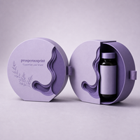 Boîte d'emballage personnalisée pour produits de soin de la peau, forme ronde, fermeture rotative, boîte rigide violette avec ruban de tirage
