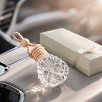 Diffuseur de parfum pour voiture en verre facetté en forme de coquillage, réutilisable, 14 ml, avec bouchon en bois naturel et corde.