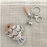 Porte-clés de haute qualité, best-seller, orné de strass scintillants multicolores en forme de lune et d'œil protecteur, avec pompons