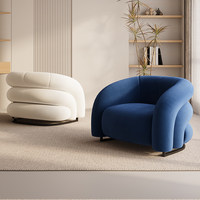 Fauteuil de salon sculptural moderne rembourré avec accoudoirs incurvés et base en métal pour hall d'hôtel, salon et réception
